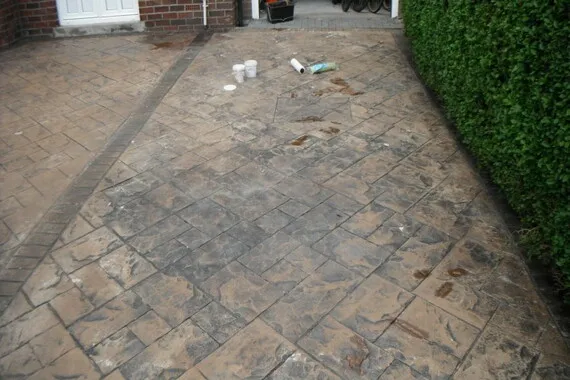 dirty and messy patio before patio cleaning service